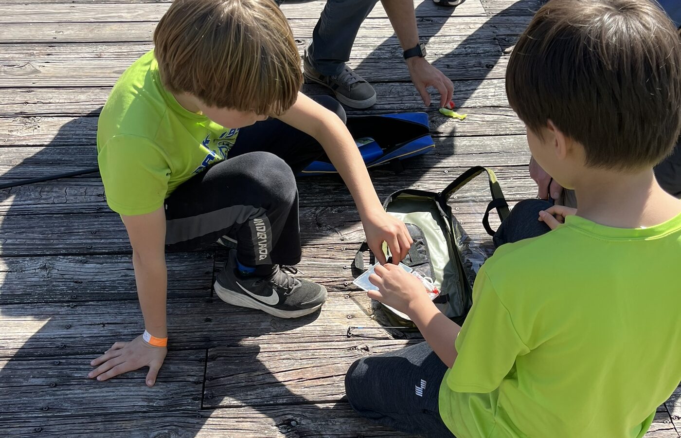 Pack 199 scouts working together on an outdoor activity.