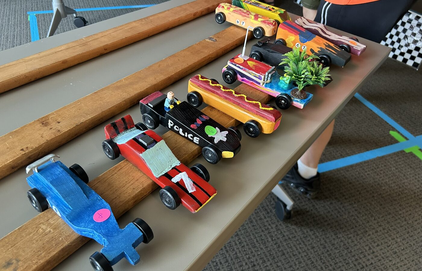Pinewood Derby cars lined up for a Pack 199 race.
