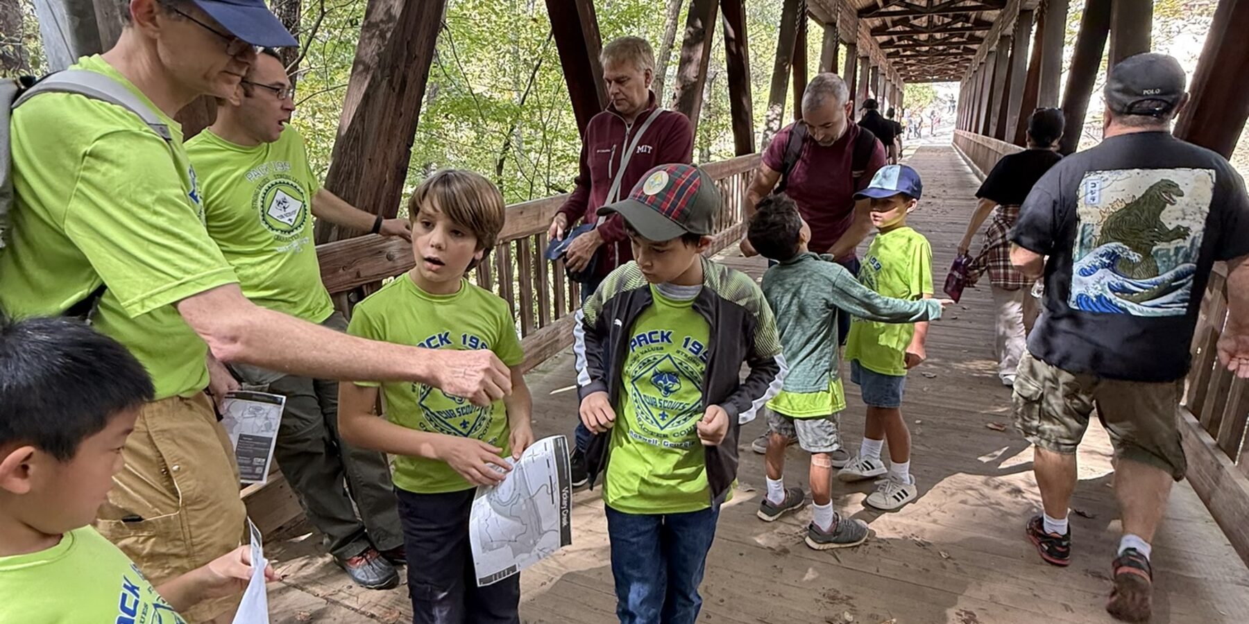 Pack 199 scouts and leaders gathered for an outdoor activity.