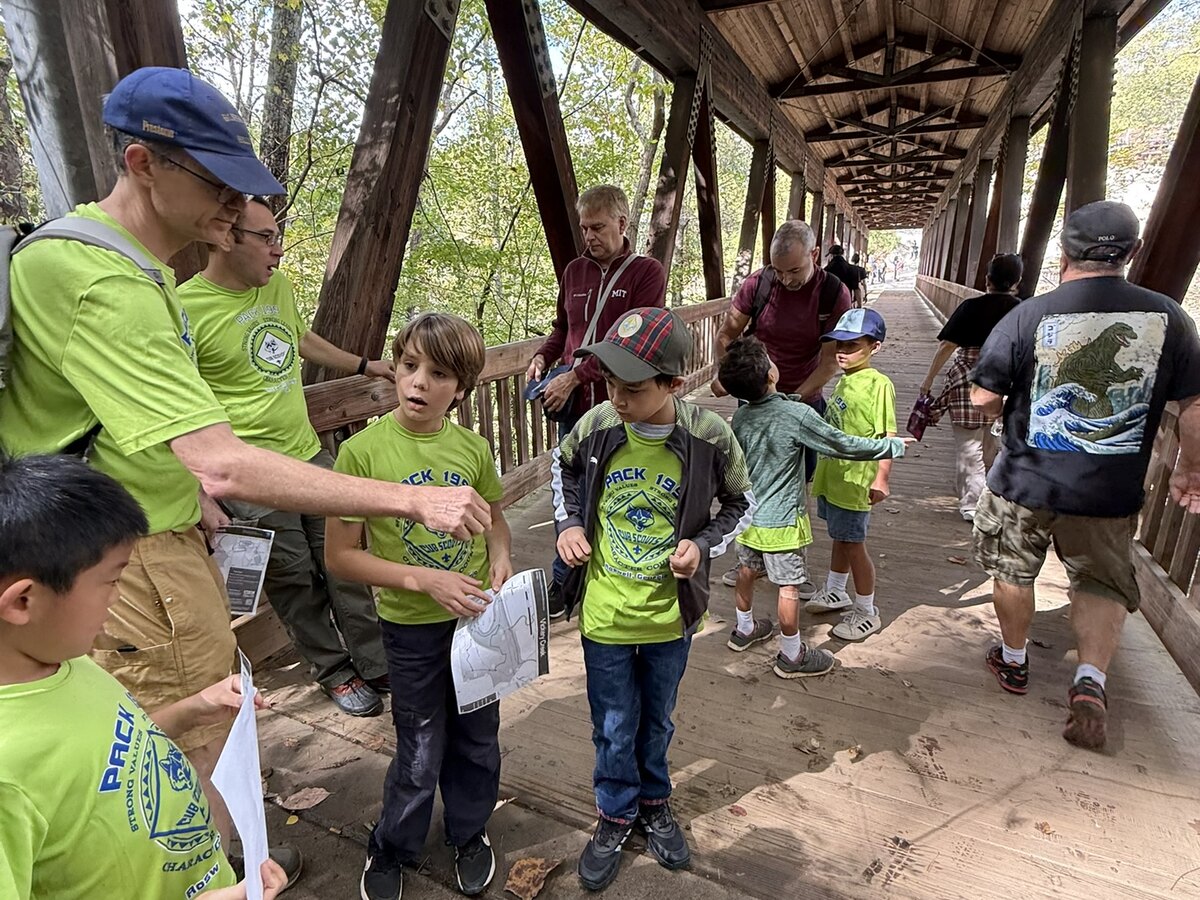 Pack 199 scouts exploring outdoors during a pack activity.